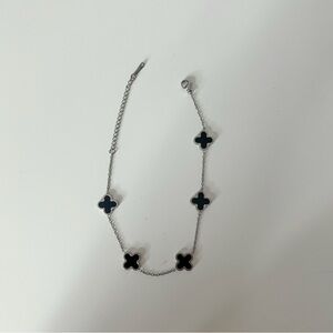 Elegant Black and Silver Women's Clover Bracelet.